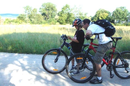 People playing City Poker on bikes